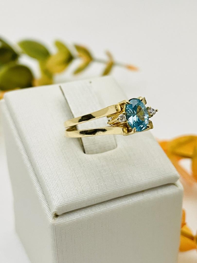 Anel duplo com Banho de Ouro 18k e Pedra Topázio Azul